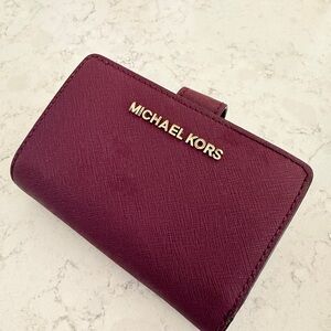 Michael Kors Plum Wallet with Gold Accents